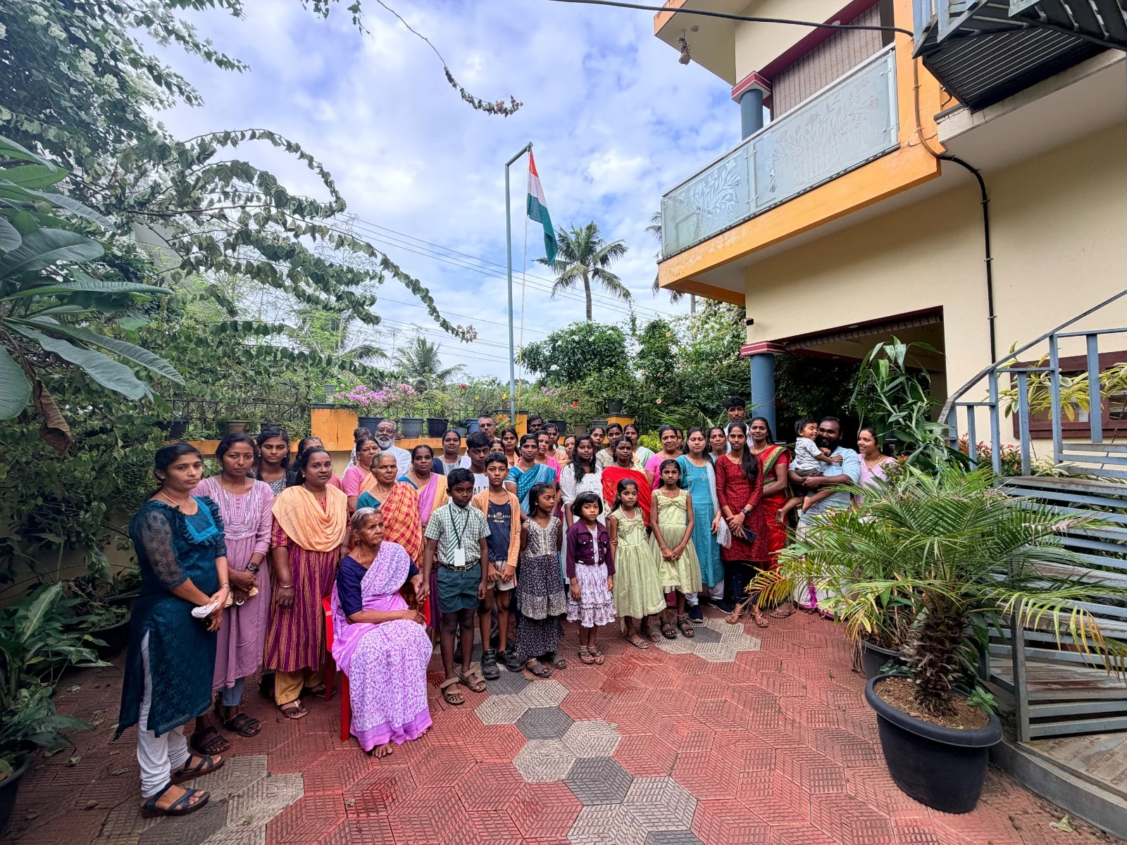CADRE-India community members, staff and families gathered outside the centre